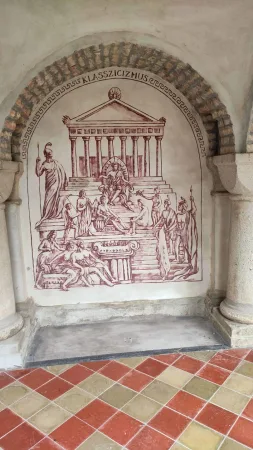 Nástěnná malba zobrazující antický výjev s nápisem klasicizmus